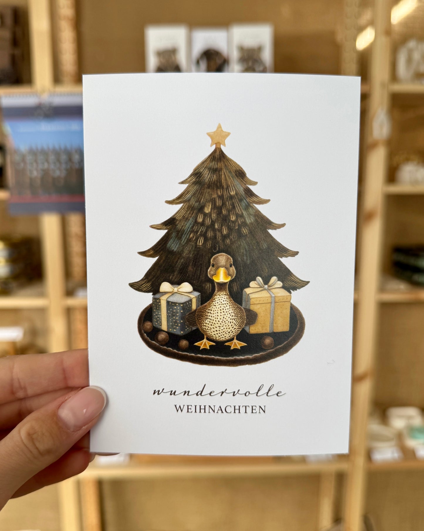 Weihnachten: Postkarte „Ente unterm Tannenbaum“
