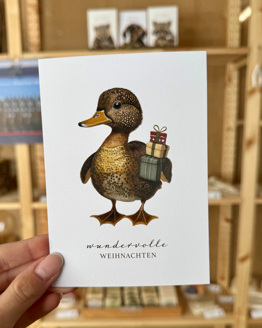 Weihnachten: Postkarte „Ente mit Geschenken“